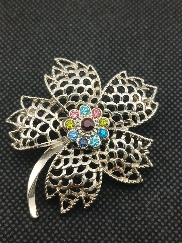 MCM silver tone open work filigree multicolor stones floral design brooch