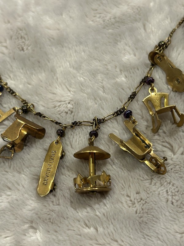 Pididdly Brass Necklace tiny Purple Glass Beads and 15 Mechanical Charms Vintage gallery