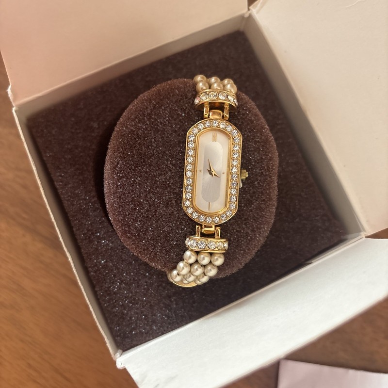 VTG Elizabeth Taylor Avon Evening Star Watch Gold Tone Faux Pearl New in Box gallery