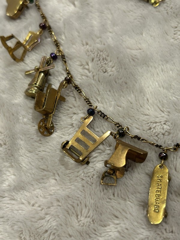 Pididdly Brass Necklace tiny Purple Glass Beads and 15 Mechanical Charms Vintage gallery
