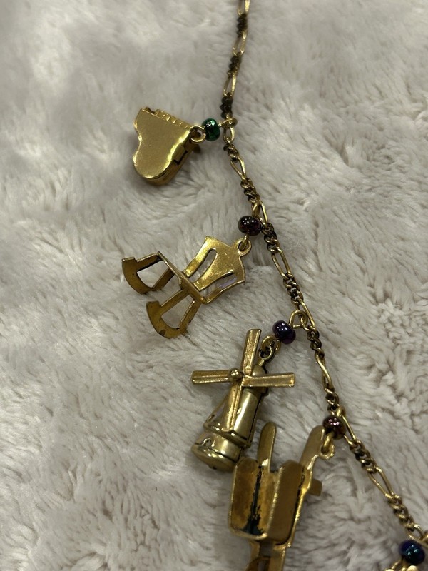 Pididdly Brass Necklace tiny Purple Glass Beads and 15 Mechanical Charms Vintage gallery