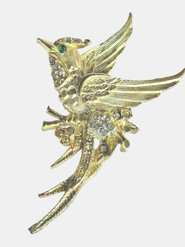 This elegant vintage-style gold-tone bird brooch 3” long by 1.5” wide gallery