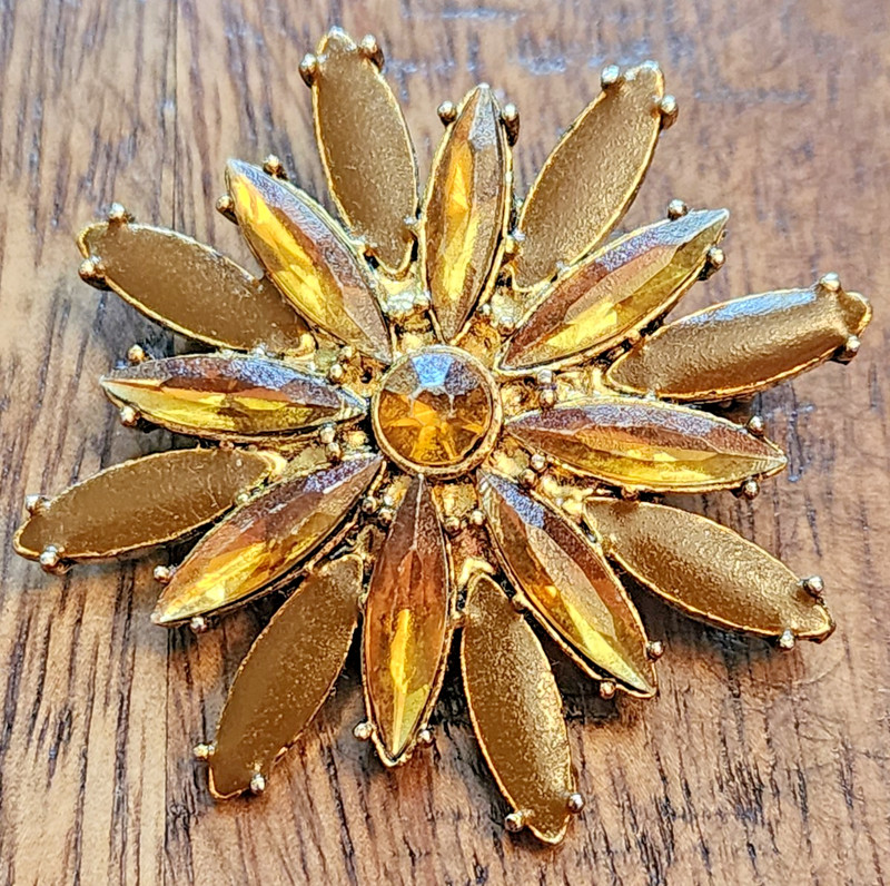 Vintage Sunburst Brooch features Amber Colored Stones in Prong Setting