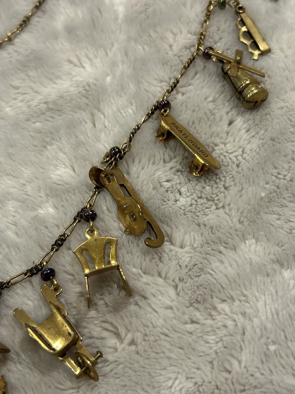 Pididdly Brass Necklace tiny Purple Glass Beads and 15 Mechanical Charms Vintage gallery