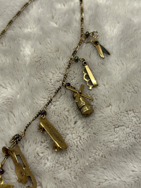 Pididdly Brass Necklace tiny Purple Glass Beads and 15 Mechanical Charms Vintage gallery