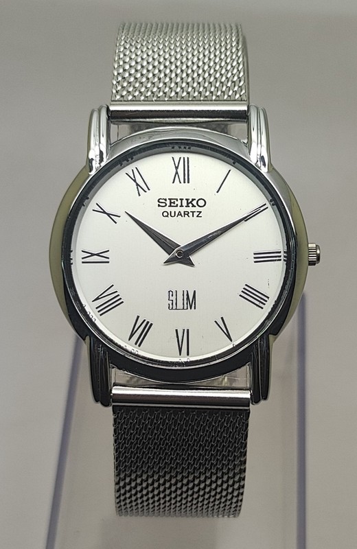 Vintage Seiko Slim Quartz White Dial Men's Wrist Watch